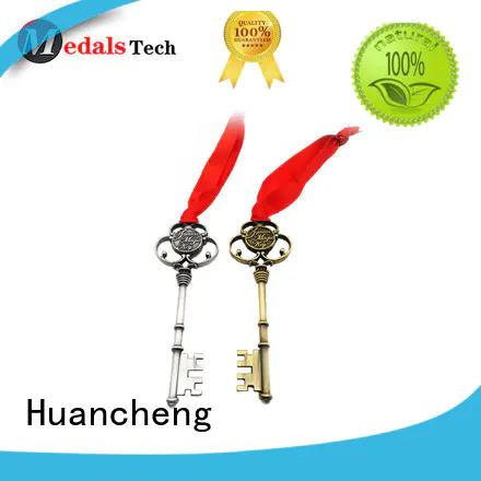 Huancheng Brand shiny promotional souvenir home keychain metal logo