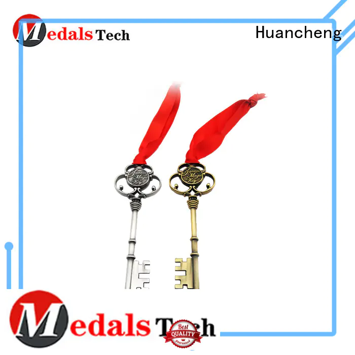 home keychain souvenir promotional shape Huancheng Brand name keychains